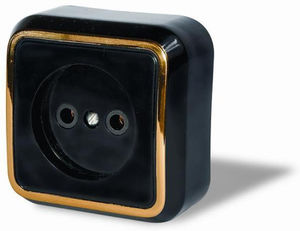 Розетка открытой установки одноместная, серия Москвичка, цвет черный с рамкой под золото